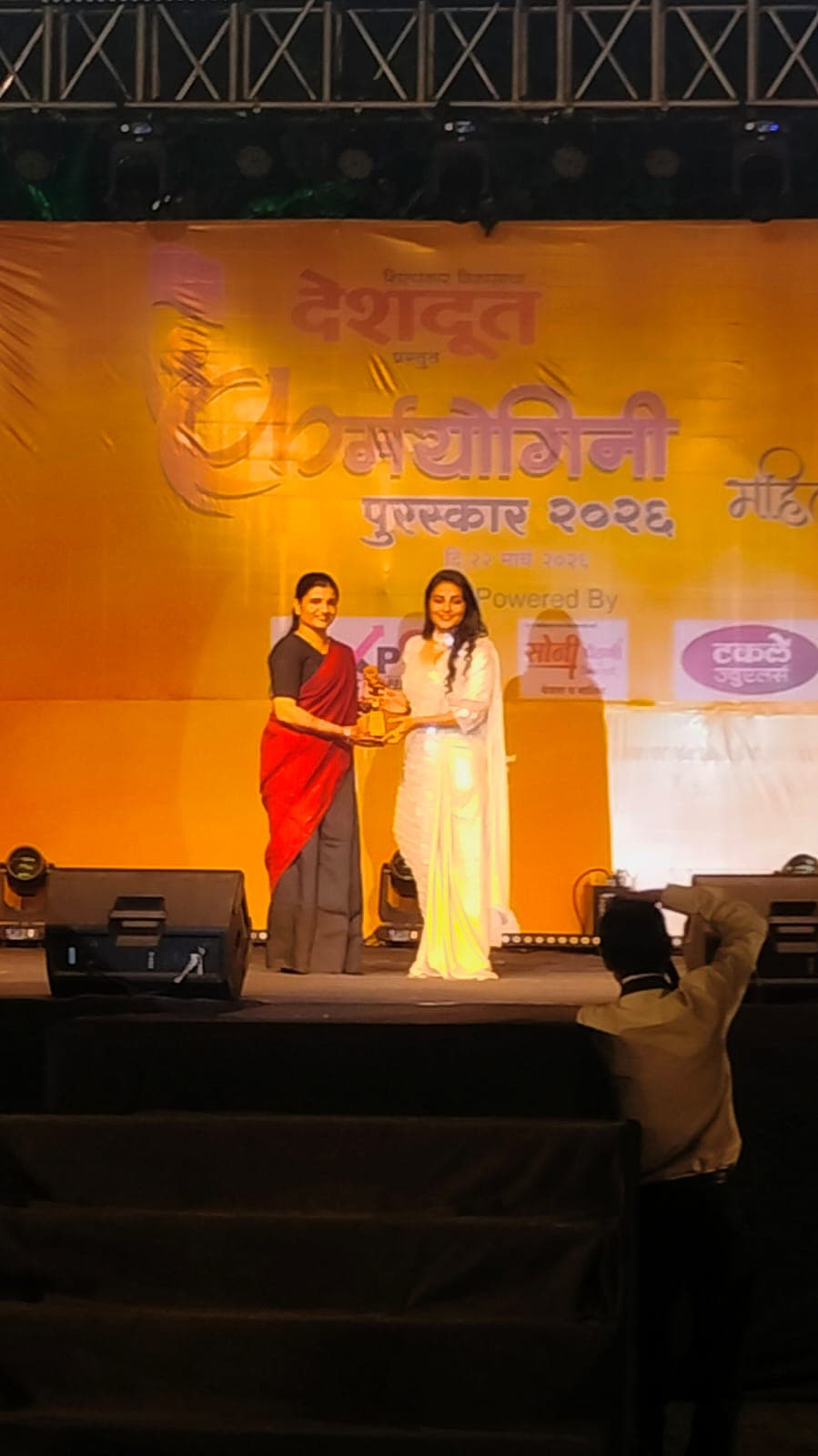Karmayogini Award 2026 ceremony stage, organised by Deshdoot, Nashik
